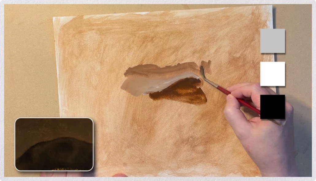 Hand painting a leaf study using the insertion transition technique with brown and white gouache.